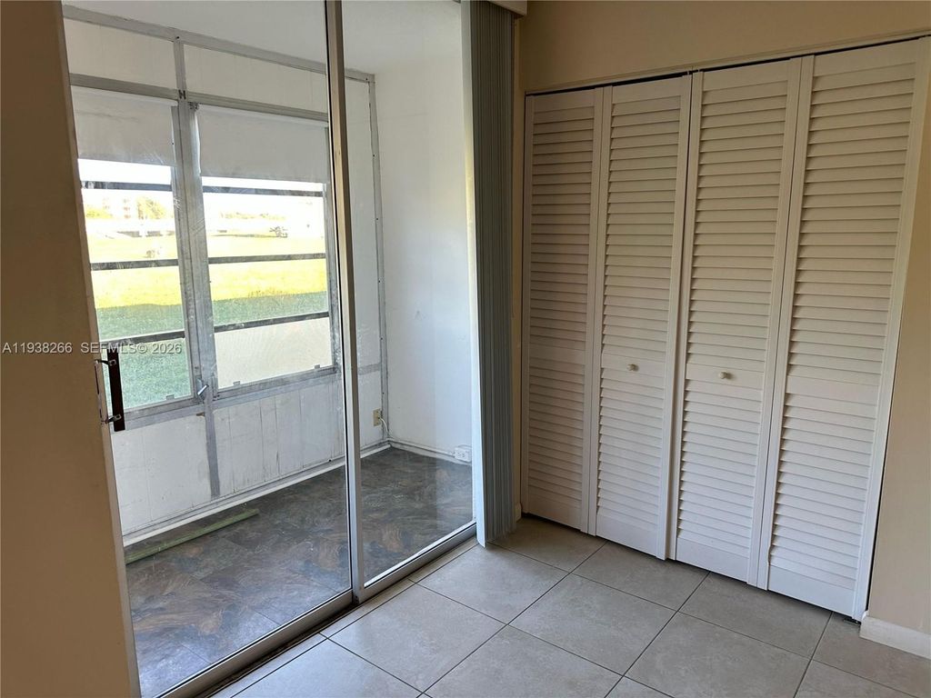 Photo of 8851 Sunrise Lakes Blvd #112, Sunrise, FL 33322 (MLS # A11938266)