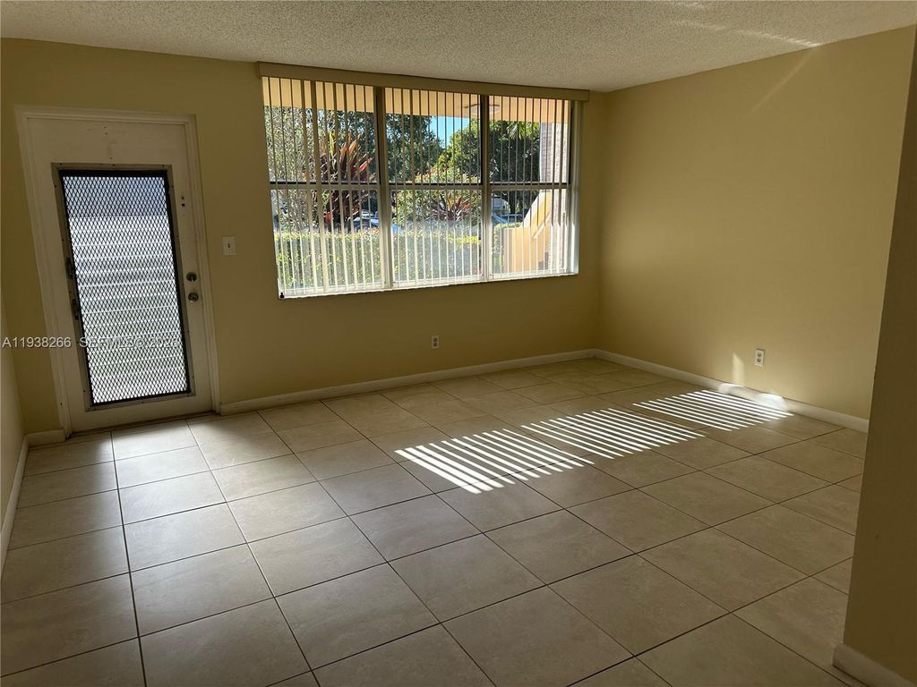 Photo of 8851 Sunrise Lakes Blvd #112, Sunrise, FL 33322 (MLS # A11938266)