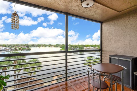 Photo of 1100 Colony Point Cir #504, Pembroke Pines, FL 33026 (MLS # A12100264)