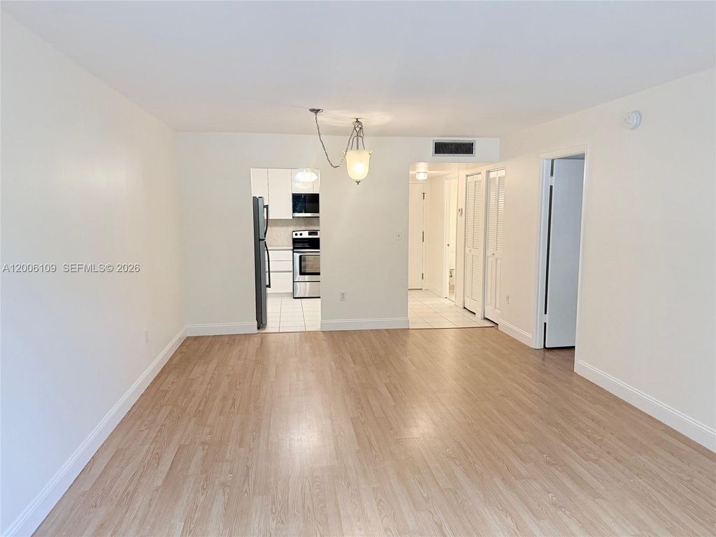 Photo of 1400 Saint Charles Pl #314, Pembroke Pines, FL 33026 (MLS # A12006109)