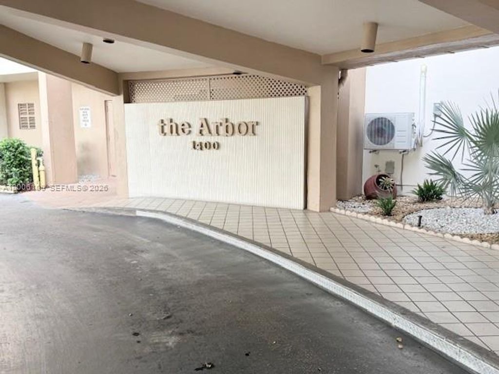 Photo of 1400 Saint Charles Pl #314, Pembroke Pines, FL 33026 (MLS # A12006109)