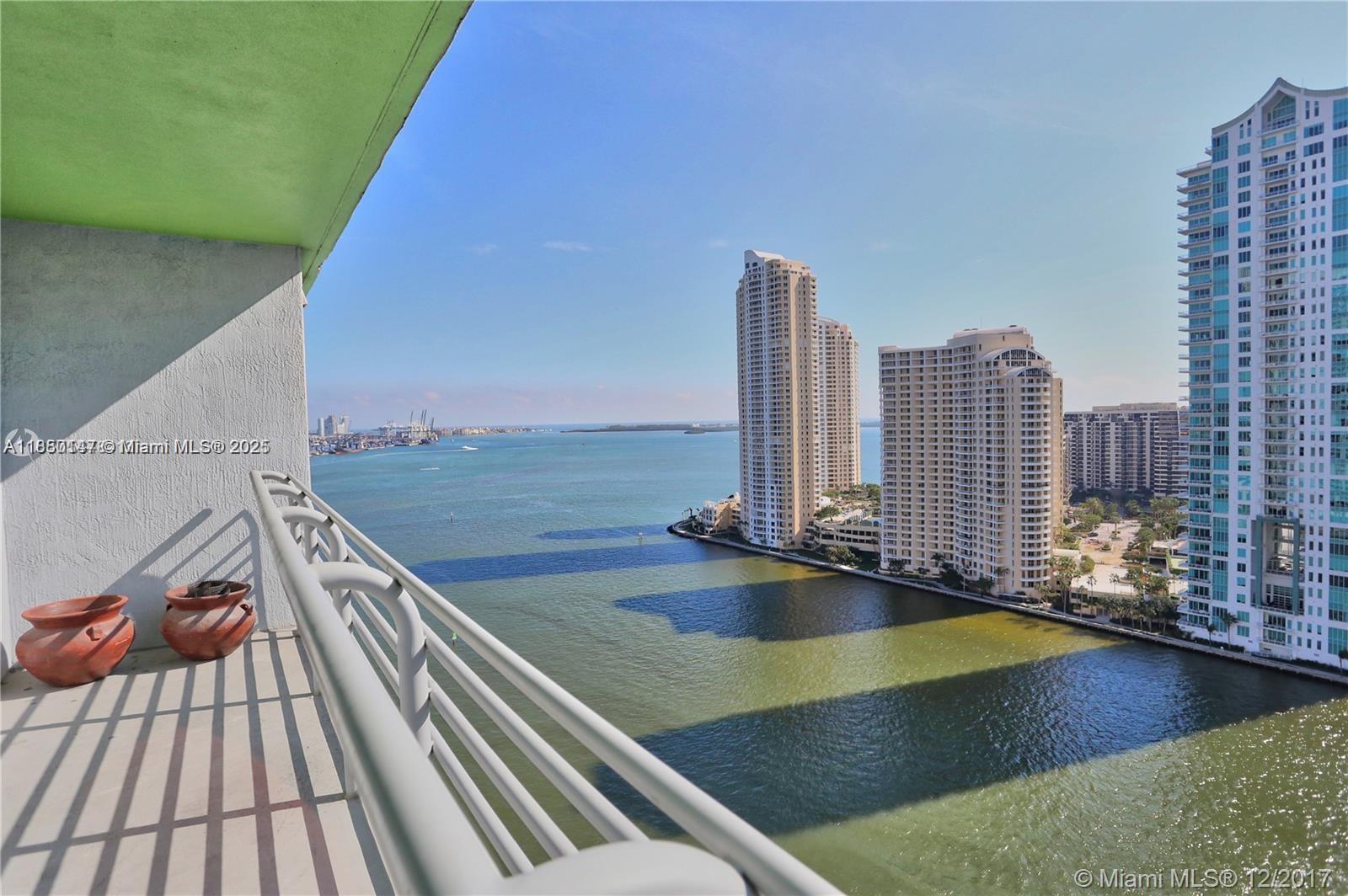 SPECTACULAR VIEWS OF THE BAY, MIAMI RIVER AND BRICKELL KEY. SPACIOUS UNIT, TILED THORUGHOUT, OPEN KITCHEN AND LARGE WALK IN CLOSET. MUST SEE TO APRECIATE.