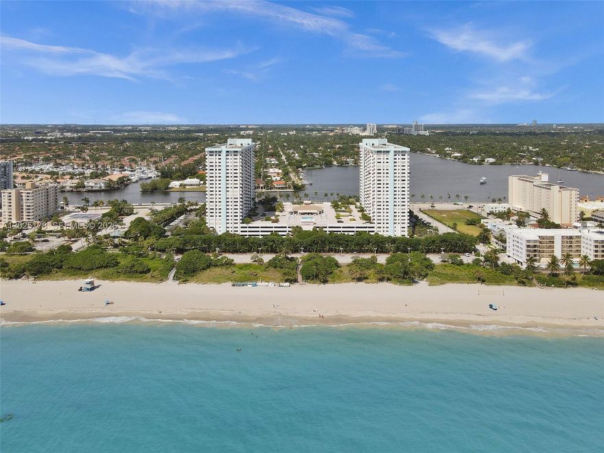 OCEAN VIEWS! 40 YR BUILDING CERTIFICATION COMPLETED! HAS RESERVES! NO SPECIAL ASSESSMENTS! IN-UNIT Washer and Dryer! UPDATED condo with ocean and pool views! Features wood laminate flooring throughout the living areas and bedrooms. The kitchen features granite countertops and ample cabinet space—primary bedroom with a walk-in closet and en-suite bathroom with a walk-in shower. Den can be converted to a 2nd bedroom! The building offers a heated pool, exercise room, tennis, pickleball, basketball, sauna, and community room. CENTRALLY located near Hollywood Beach Boardwalk with shopping and restaurants!