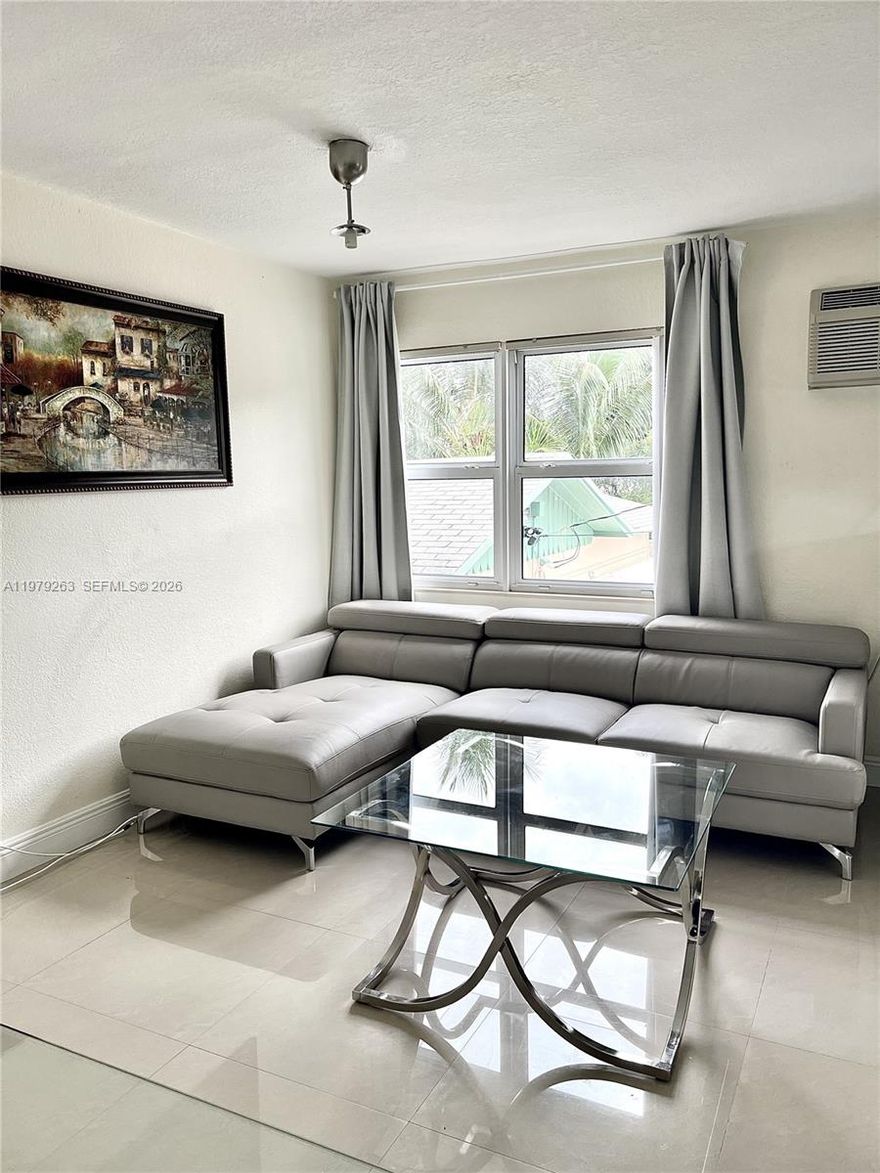 Welcome to this beautifully renovated 1-bedroom, 1-bath corner apartment located in a quiet and well-maintained community. This unfurnished unit offers a clean, modern space ready for your personal touch.

The apartment features tile flooring throughout and an updated kitchen with stainless steel appliances and wood cabinetry, providing both style and functionality. The layout is bright and open, with a spacious bedroom that includes built-in closets for convenient storage. The bathroom includes a full bathtub and modern finishes.

Residents benefit from reserved parking and on-site laundry facilities for added convenience. Small pets up to 25 lbs are welcome with a pet deposit.

Ideally situated just minutes from the dining, shopping, and nightlife at Young Circle, and only a short drive to the beach. The unit is tenant-occupied and available for showings with 24-hour notice.

Move-in requires first month’s rent and two months’ security deposit. Fast application process — schedule a showing today.