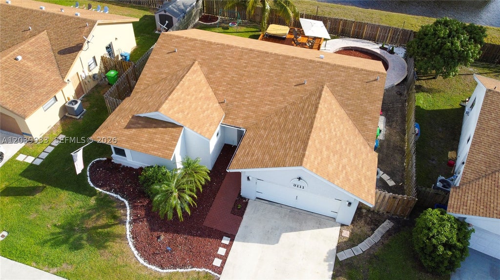 Photo of 3111 NW 107th Dr, Sunrise, FL 33351 (MLS # A12039933)