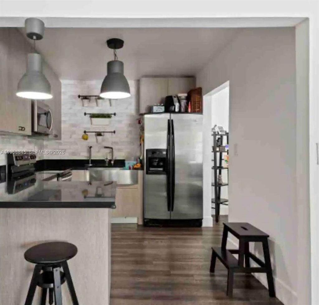 Photo of 3008 NW 13th St, Miami, FL 33125 (MLS # A11958845)