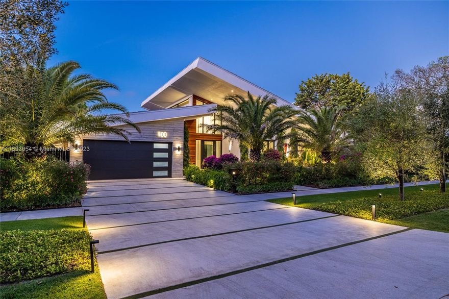 Introducing The Glass House Miami Shores, a brand new tropical modern designer masterpiece. Expansive volumetric interiors, iconoclastic architecture and exquisite finishes set this home apart, with an open airy feel and seamless indoor-outdoor spaces. Soaring 21’ French White Oak vaulted ceilings, European wide plank herringbone floors, floating walls and grand natural light-filled living room flow to chef’s kitchen with Miele appliances, media room and lush ensuite bedrooms. Resort-style oasis with 18X40 pool, privacy landscaping, covered terraces, summer kitchen and hidden “speakeasy”. Includes “smart house” automation system plus an air-conditioned two-car garage with Tonal gym. Totally turnkey with indoor-outdoor furniture, towels, bath robes, and even a new golf cart. Simply magical!