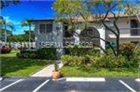 Photo of 5710 Princess Palm Ct #A, Delray Beach, FL 33484 (MLS # A11961113)