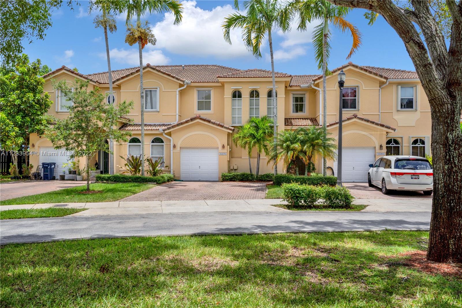 Here is your opportunity to live in Kendall Breeze!!! This beautiful 3 bedroom 2-1/2 bathroom home offers bright and airy living areas designed for fun family living. As you walk through your front door you will be welcomed into your sanctuary with a view straight through your home and out to your shaded backyard patio with calming and inviting landscaping. The kitchen is beautifully updated with a nook that serves as your personal coffee bar. You will absolutely love the bedrooms upstairs and your master suite! The laundry area is also upstairs to make your life easier. The 1-car garage is also deep to allow your car to fit, as well as for storage. Kendall Breeze also offers 3 community pools, open park areas, playgrounds, exercise room and a clubhouse available for your use.