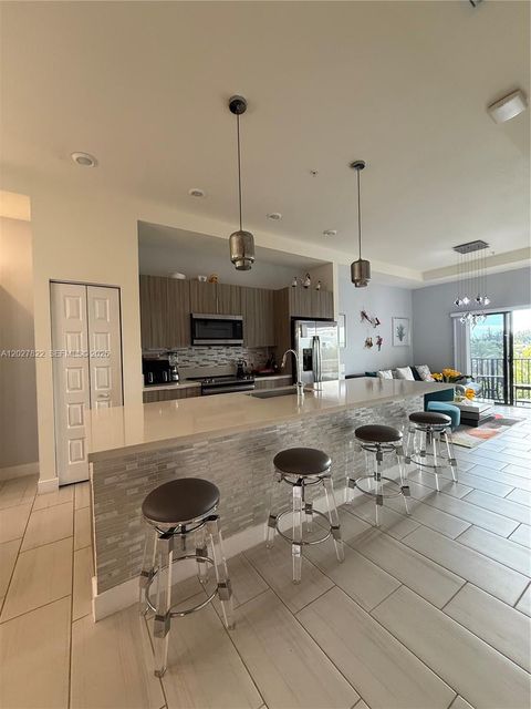 Photo of 7815 NW 104th Ave #32, Doral, FL 33178 (MLS # A12027822)