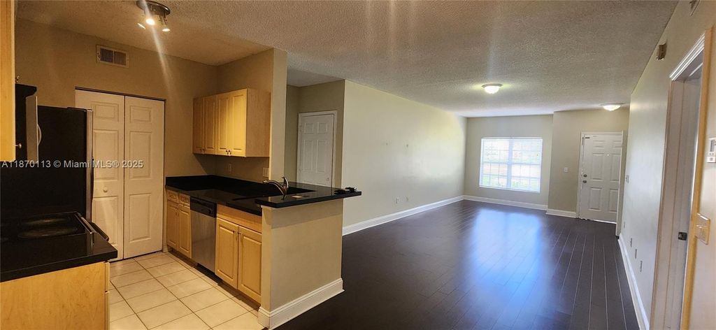 Photo of 10366 S Fox Trail Rd S #1710, Royal Palm Beach, FL 33411 (MLS # A11870113)