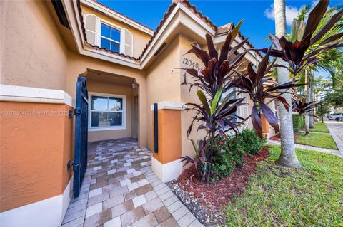 Photo of 12040 SW 28th St #406-4, Miramar, FL 33025 (MLS # A11907804)