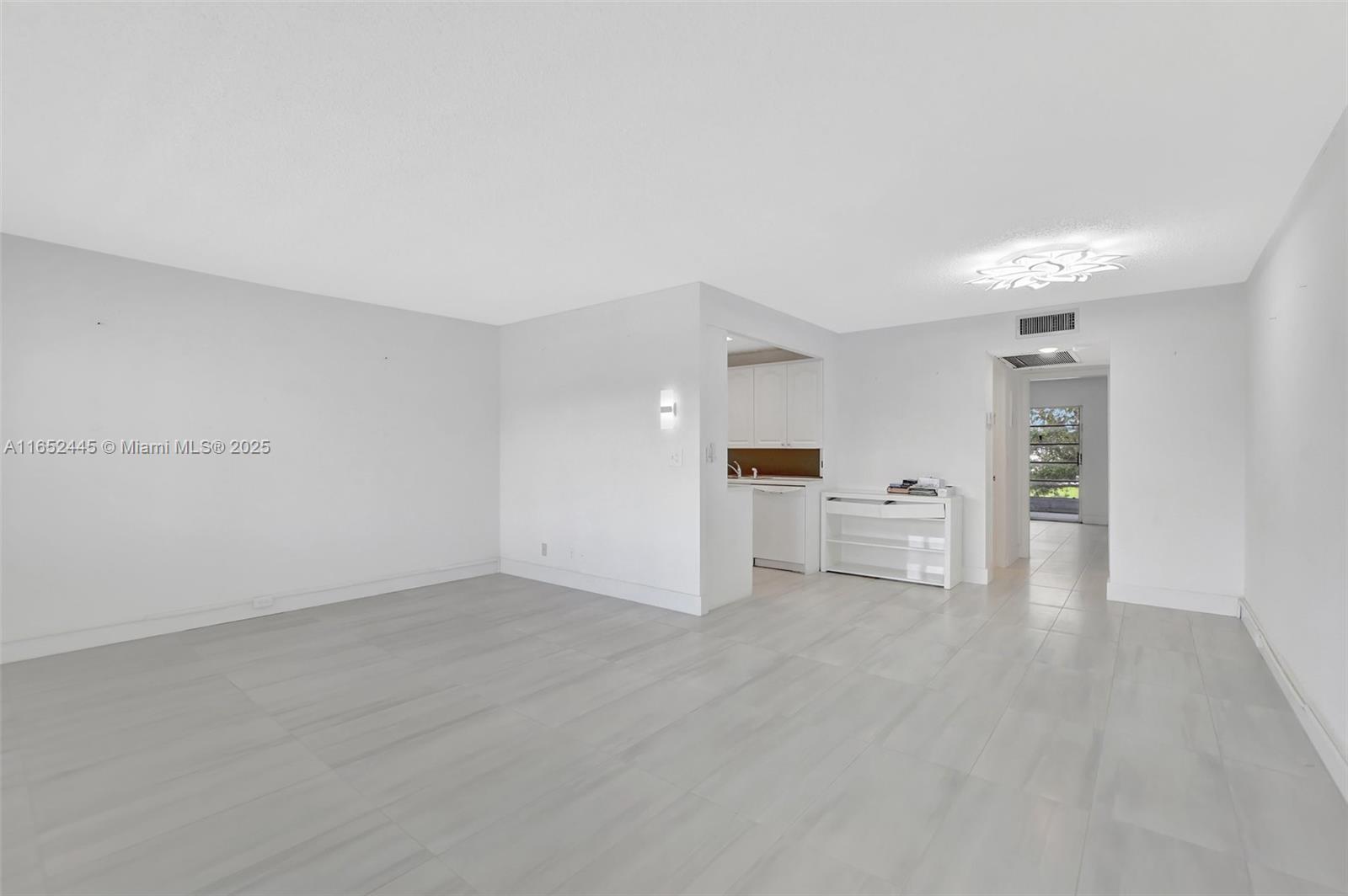 Beautifully UPDATED Century Village East 1 Bedroom/1.5 Bath condo with gorgeous lake views. NEW A/C 2024. Open concept living/dining room with light & bright kitchen. Extra large primary bedroom with a full wall of closets & ensuite. Enjoy your patio as an additional sitting area/office, or TV room. The unit has a prime location close to the Clubhouse. Live a resort lifestyle in this wonderful gated community w/24 HR Security. 5-Star amenities including Shuttle Bus, Indoor/Outdoor Pools, Tennis/Pickleball Courts, Shuffleboard, Theater, Billiards, Walking/Jogging Paths, Restaurant, & Social Activities and much more! Maintenance Fee includes the amenities & Cable TV. Walking distance to Synagogue. Don't miss this wonderful opportunity.