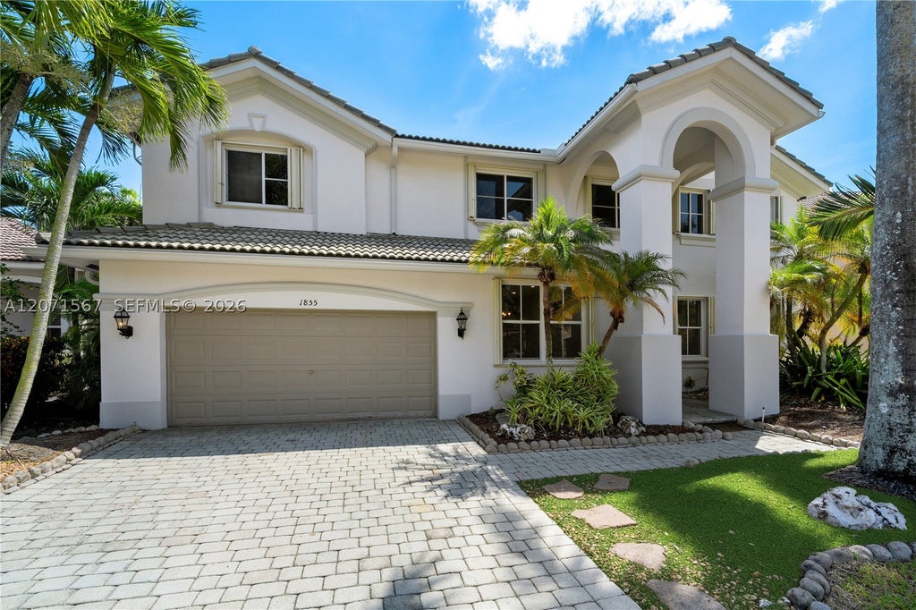 Photo of 1855 Hidden Trail Ln, Weston, FL 33327 (MLS # A12071567)