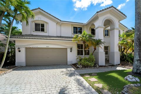 Photo of 1855 Hidden Trail Ln, Weston, FL 33327 (MLS # A12071567)