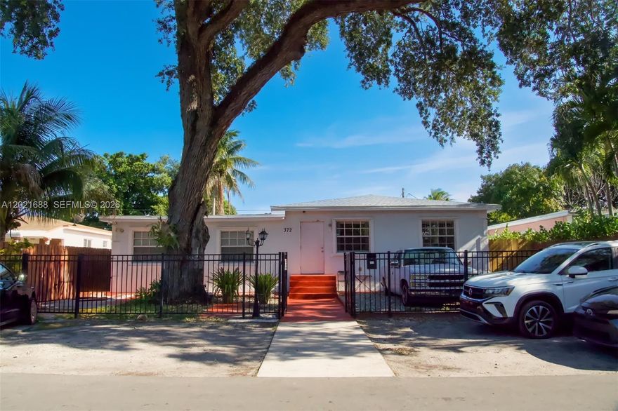 Truly one of a kind and an absolute pleasure to show! This beautifully remodeled home features spacious open-concept living areas filled with natural light, creating a warm and inviting atmosphere throughout. The modern kitchen offers an open layout with a breakfast area, perfect for everyday living and entertaining. The property includes 2025 roof, remodeled bathrooms, new plumbing, two central A/C units (one was replaced in 2025), and a private primary suite complete with its own living area, bar, private entrance, and ensuite bath — ideal for guests, in-laws, or added privacy. Step outside to enjoy  a spacious patio, and a large cemented deck perfect for gatherings and outdoor enjoyment. The fully fenced property includes exterior lighting, a storage shed, and ample parking for 4+ vehicles. This unique home offers comfort, versatility, and exceptional outdoor space with countless additional features throughout. This property offers excellent flexibility for investors, extended families, owner occupants or owner-occupants seeking rental income potential. Excellent location!! few blocks to I 95, palmetto expressway and Turnpike. Few minutes to the beach and Aventura mall. Walking distance to restaurantes, supermarkets and shopping centers. Showings by appointment only.