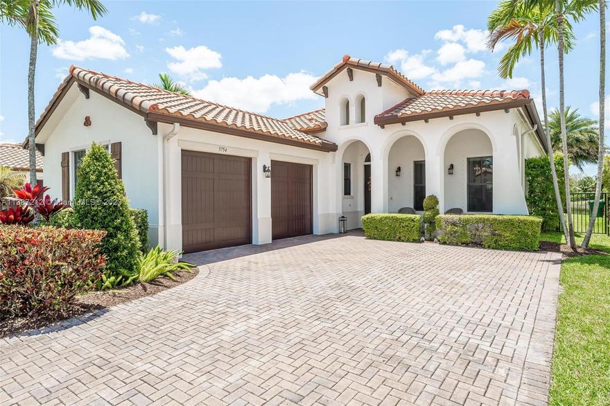 Fantastic sought after lake front Chapala model  in the exquisite community of Monterra in Cooper City.  Fabulous 4/3 with popular split floor-plan, this open and airy home has  soaring 12 foot ceilings and spacious rooms. Tons of natural lighting from the many windows and slider.  Home is in pristine condition ~turnkey~ move right in!  Sit on the patio and enjoy the cool breezes from the pretty lake. Large lot with room for play, pets and pool! Live the luxurious South Florida lifestyle with the community's resort like amenities; huge pool, tennis, fitness center and more. Guard gated community adds to the upscale appeal. Excellent Cooper City schools and terrific location near shopping and highways.  Monterra is Cooper City's premier location and this one is a WINNER!