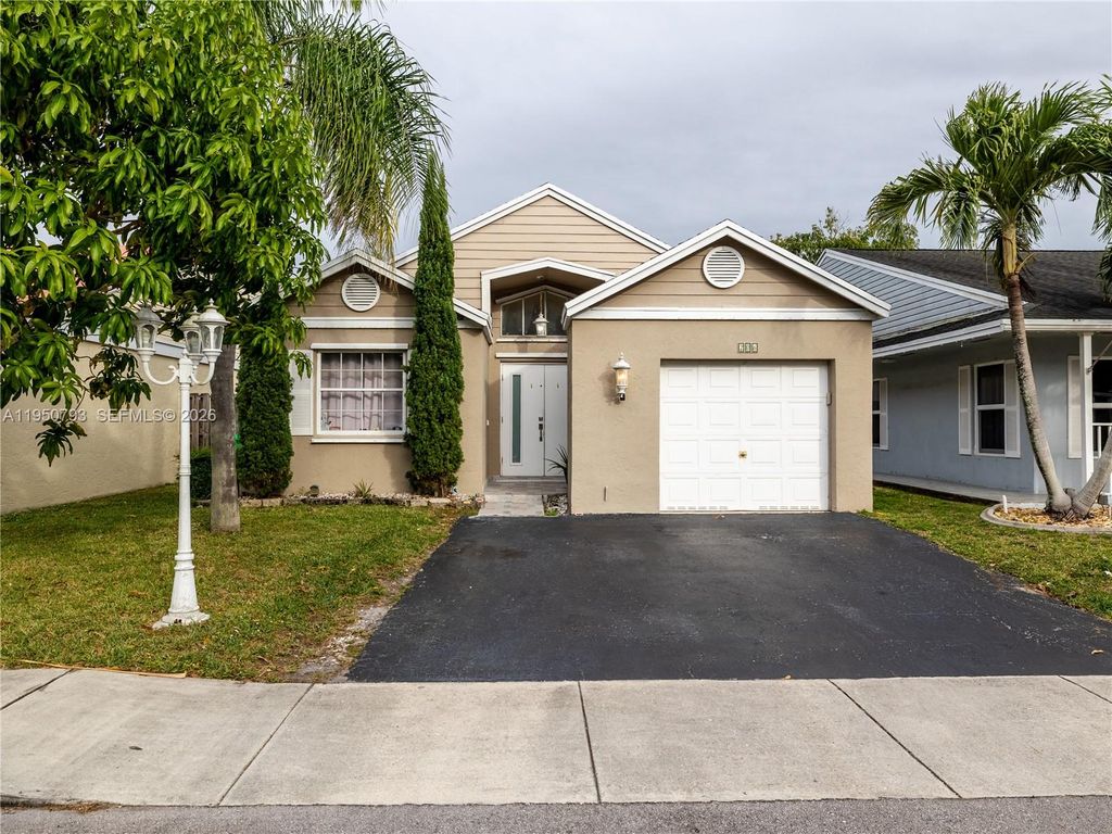 Photo of 206 SW 159th Way, Sunrise, FL 33326 (MLS # A11950793)
