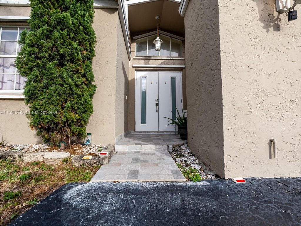 Photo of 206 SW 159th Way, Sunrise, FL 33326 (MLS # A11950793)