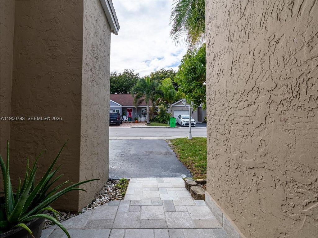 Photo of 206 SW 159th Way, Sunrise, FL 33326 (MLS # A11950793)