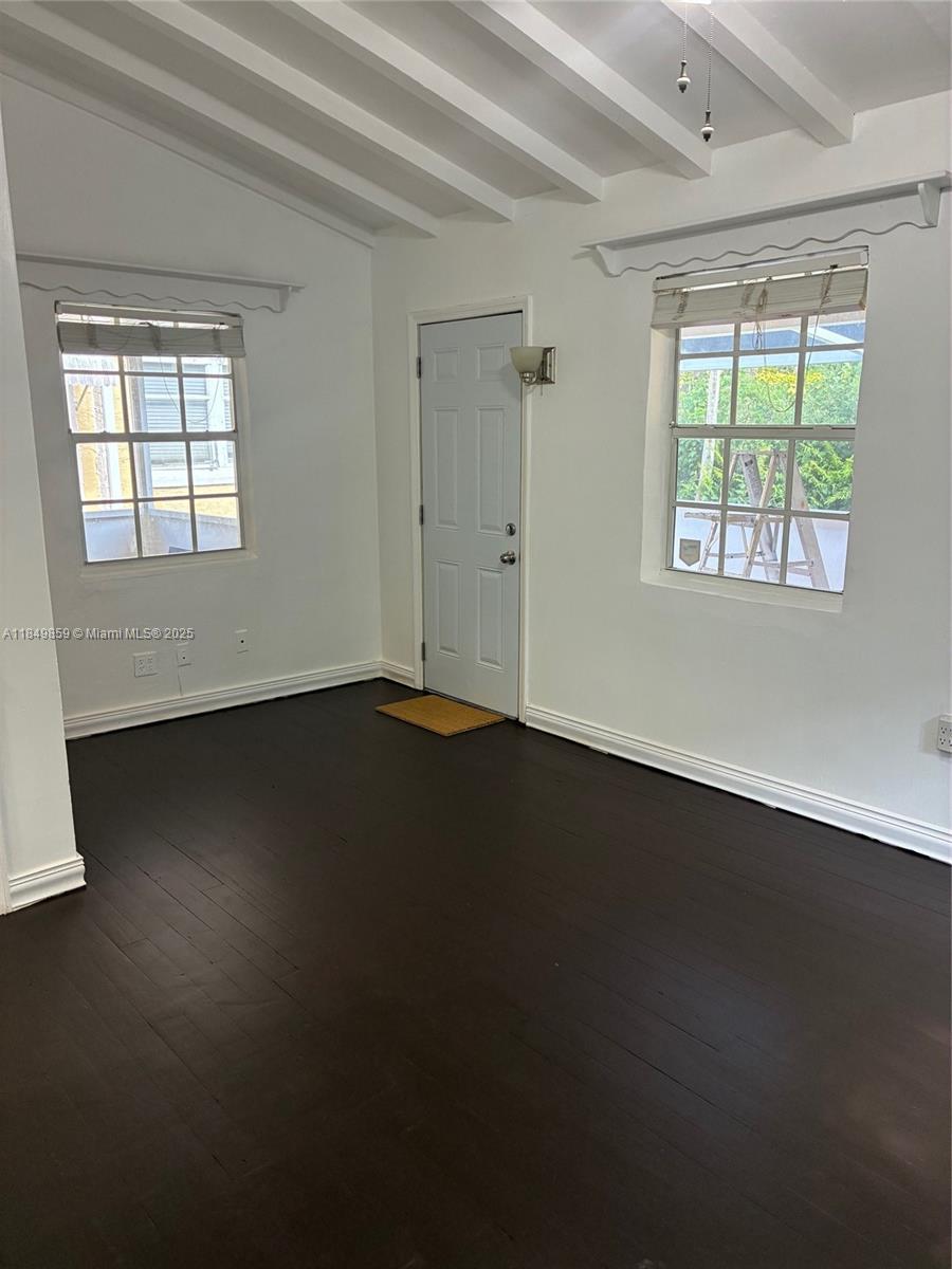 Located on a picturesque tree-lined street, this beautifully maintained efficiency offers a perfect blend of character and convenience. Features include gorgeous wood floors, cathedral ceilings, large closet, kitchen, updated bathroom, and washer and dryer. Enjoy two screened patios—ideal for relaxing or entertaining—as well as a private entrance and dedicated driveway parking. Available now—don’t miss this rare opportunity to live in one of Coral Gables’ most desirable neighborhoods!