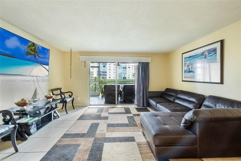 Photo of 311 SE 3rd St #105, Dania Beach, FL 33004 (MLS # A11499391)
