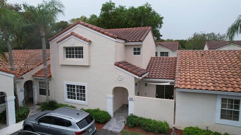 Photo of 1430 Cottonwood Cir, Weston, FL 33326 (MLS # A11945561)