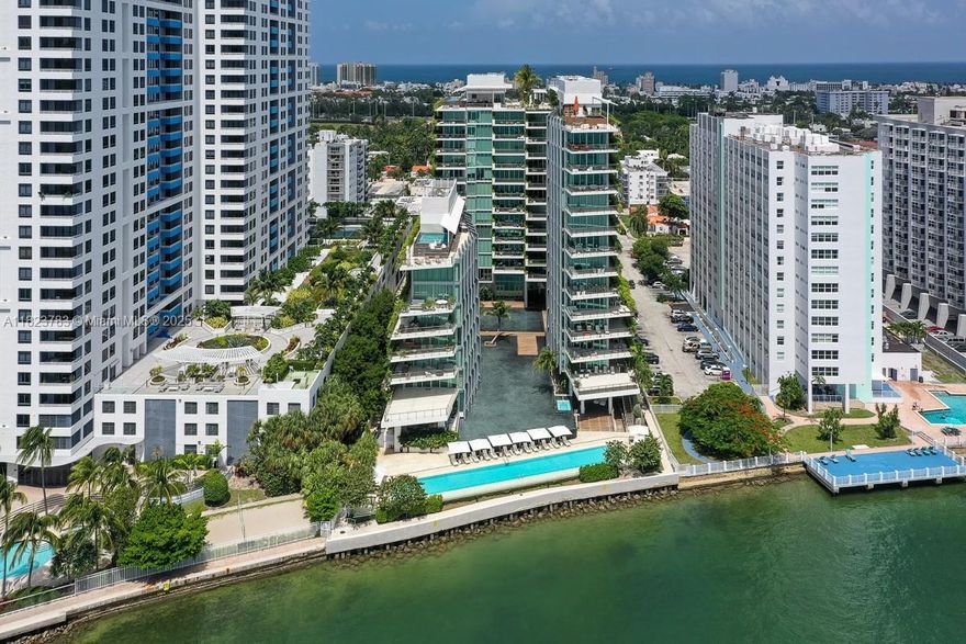 Welcome to the timeless elegance of Monad Terrace, an architectural masterpiece by Pritzker Prize-winning Jean Nouvel. This 2,500 SF residence features 3 bedrooms, 3/1 bathrooms, plus a versatile den, blending modern sophistication with the natural beauty of Biscayne Bay. Enjoy breathtaking bay, skyline, and ocean views from multiple oversized terraces—perfectly positioned for both sunrise and sunset. Inside, refined finishes include a Calcutta marble kitchen, Gaggenau appliances, custom cabinetry, newly designed closets and private elevator entry. Monad Terrace is a boutique collection of just 59 residences, offering a curated lifestyle with amenities such as a bay-front infinity-edge pool, sun deck, wellness-focused juice bar, strength and cardio gyms, valet service, and 24/7 concierge.