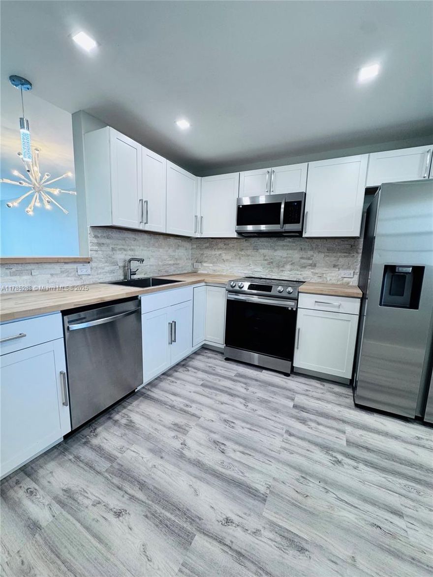 Step into this beautifully remodeled 2-bed/2-bath apartment with gorgeous lake views in Jade Winds. Unit features open-concept living space filled with natural light, sleek new flooring, updated kitchen with SS appliances, wooden countertops, custom cabinetry, and a stylish tile backsplash—ideal for both everyday living and entertaining. Both bedrooms offer generous space, with the primary suite featuring a walk-in closet and an en-suite bath complete with a modern vanity and a walk-in shower. The second bedroom is perfect for guests, a home office, or a roommate setup, with a nearby full bath featuring equally refined finishes. Conveniently located near shopping, dining, public transit, and local parks—this apartment offers the perfect blend of comfort, style, and location.