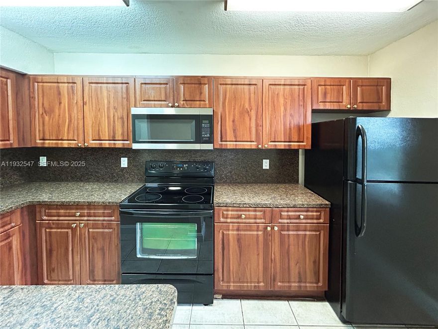 Bright and comfortable 1-bedroom, 1-bathroom apartment 

This apartment offers a welcoming living space with a smart layout and convenient features designed for everyday comfort. Enjoy practical kitchen details, generous storage, on-site amenities, and the convenience of assigned parking in a well-maintained building. 

-Tile flooring 
-Central air conditioning 
-Stove and refrigerator 
-Built-in microwave 
-Kitchen cabinets and breakfast bar 
-Ceiling fans 
-Walk-in closet in the bedroom 
-Additional closet at the entry 
-Assigned parking space 
-Laundry room in the building 
-Pool in the building