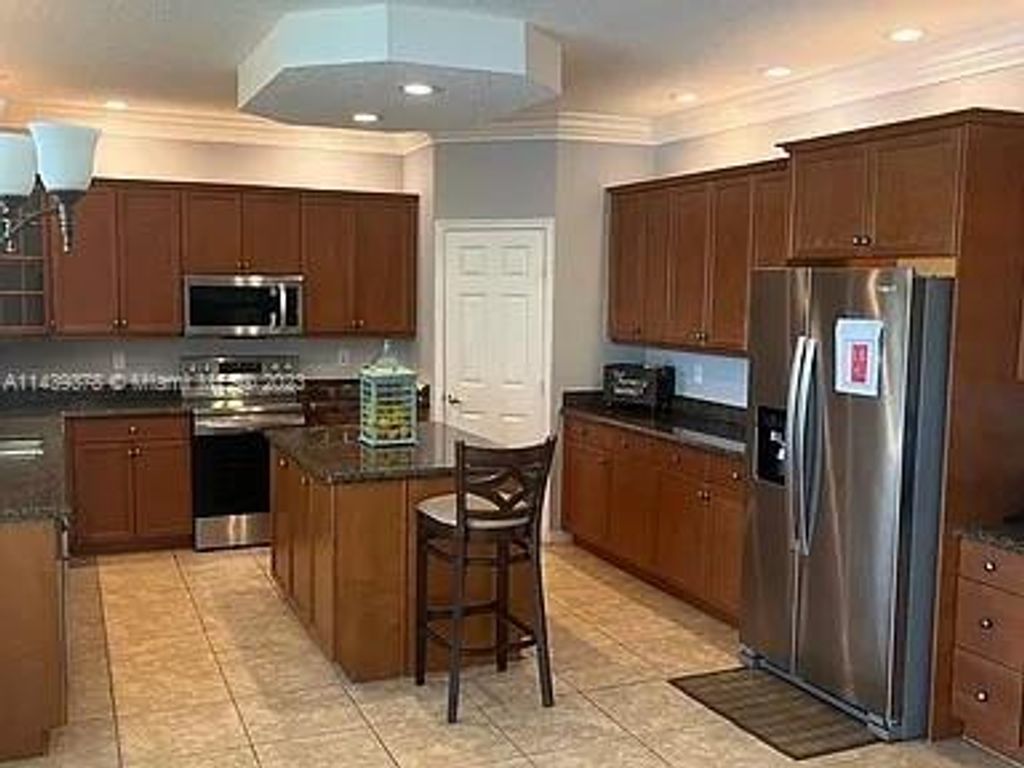 Photo of 2384 Simonson Dr, Wellington, FL 33414 (MLS # A11439378)