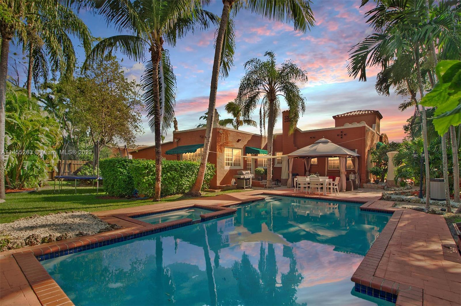 Opportunity to lease a Mediterranean masterpiece comprised of three spacious bedrooms and two baths. This unique offering graces an oversized corner lot on almost half an acre in Coral Gate. This 1930s home is filled with significant architectural details that cannot be replicated in today’s construction. The spacious sunny formal living room is graced by an elegant wood-burning fireplace, leading to a large formal dining room, perfect for entertaining. Original hardwood floors anchor the home along with impressive decorative plaster walls and tray ceilings with vintage moldings. Fabulous swimming pool area with plenty of mature landscape creating different venues for outdoor fun!