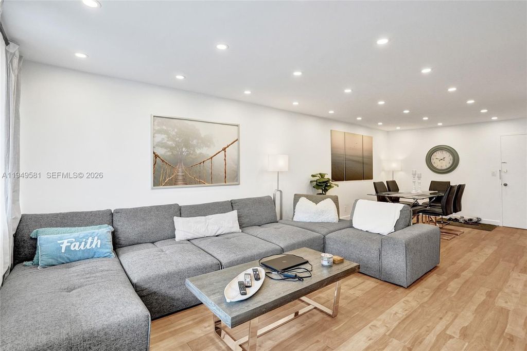 Photo of 401 Golden Isles Dr #302, Hallandale Beach, FL 33009 (MLS # A11949581)