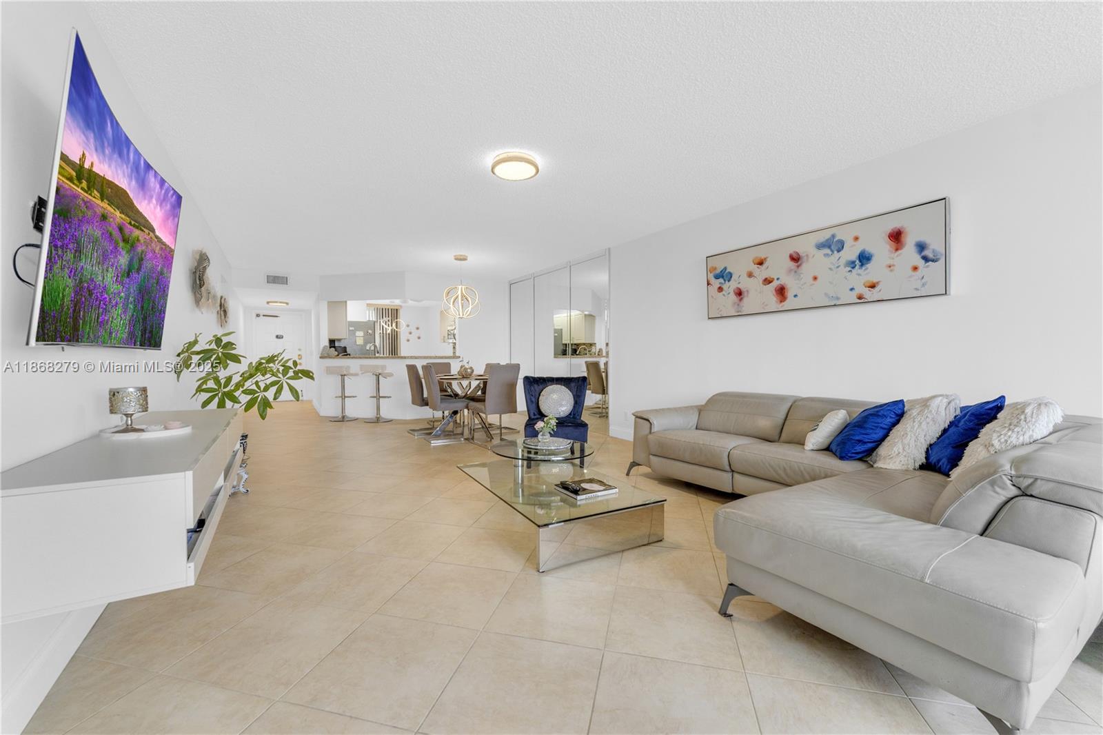 This beautifully renovated apartment seamlessly blends modern design with classic charm, creating a welcoming and stylish living space in the desirable community of Sunrise Lakes Phase 4 with amazing golf course and lagoon views. Resort style 55+ community in Sunrise. Located near highways, shopping centers, restaurants and much more. Amenities include gated community with 24/7 security, heated pool, movies, restaurants, free shutters and bus service as well, fitness center, golf , tennis courts and more. Maintenance fee includes water, trash, internet and basic cable.