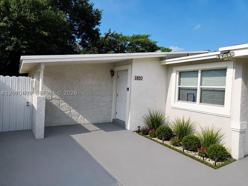 Photo of 2820 NW 14th Ct, Fort Lauderdale, FL 33311 (MLS # A12070609)
