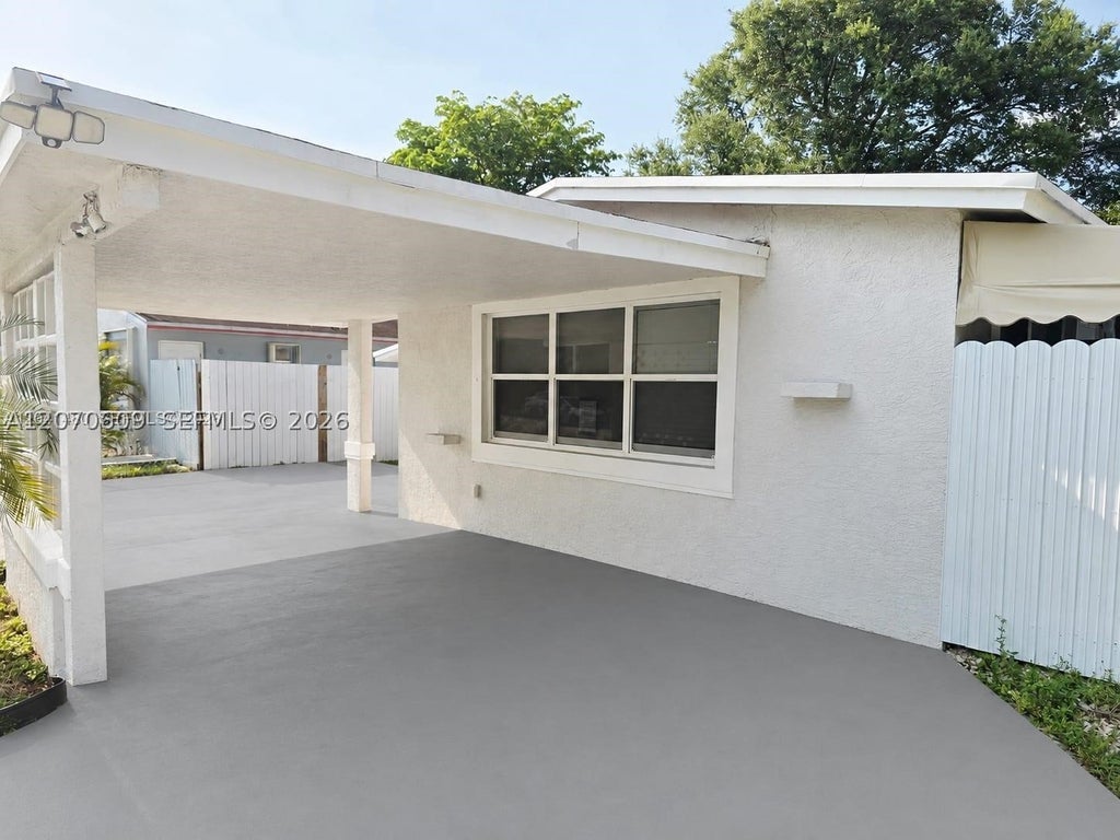 Photo of 2820 NW 14th Ct, Fort Lauderdale, FL 33311 (MLS # A12070609)
