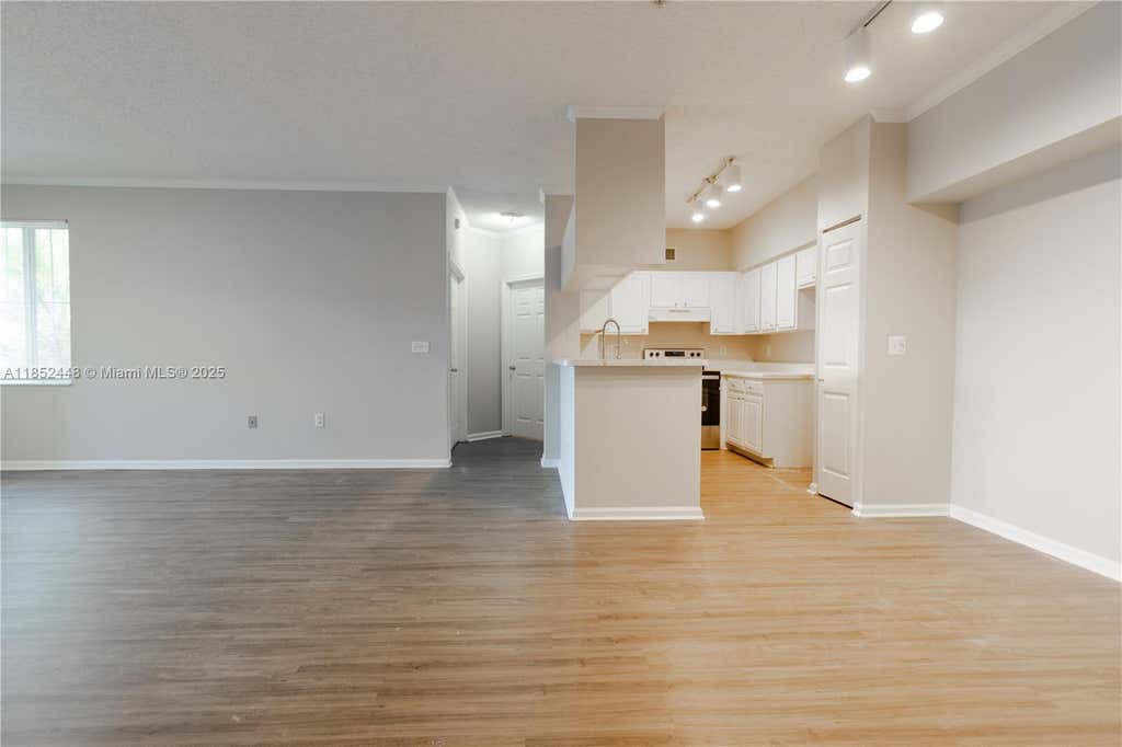 Photo of 11611 W Atlantic Blvd #1332, Coral Springs, FL 33071 (MLS # A11852448)