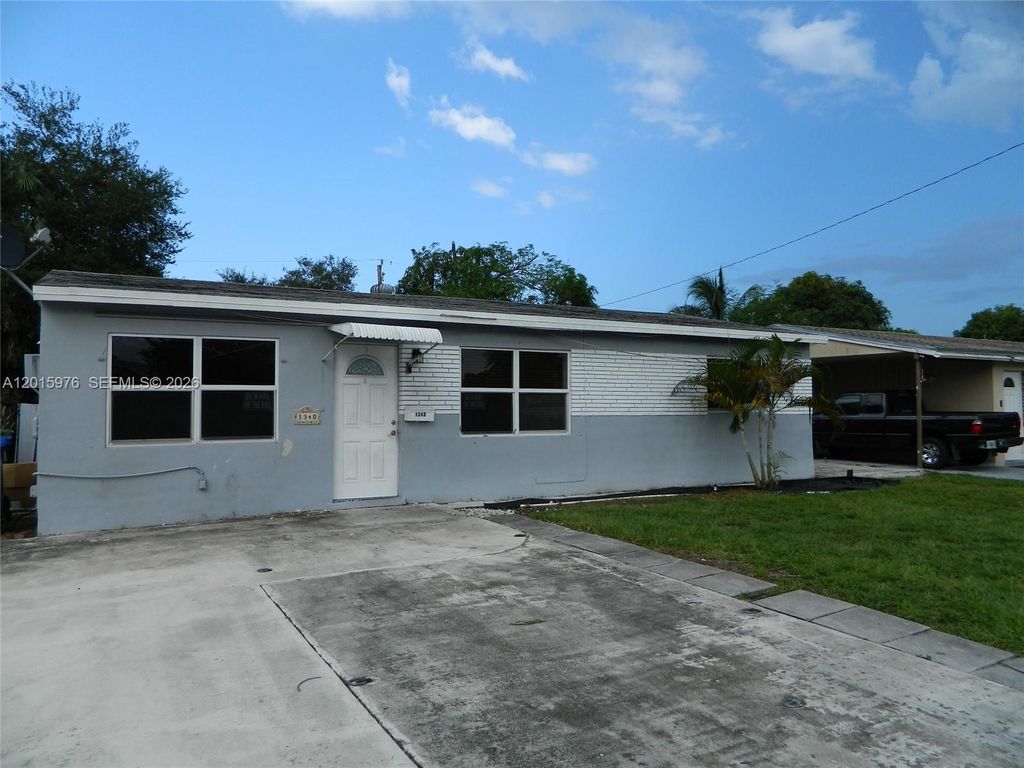 Photo of 1340 SW 34th Ave, Fort Lauderdale, FL 33312 (MLS # A12015976)
