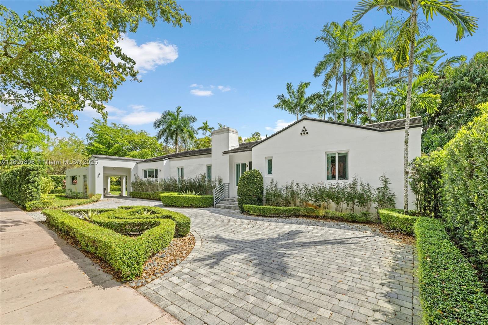 Stunning 3-bed, 2-bath home in prime Coral Gables location! Featuring elegant hardwood floors, impact windows, updated kitchen with granite countertops & stainless steel appliances, and beautifully remodeled bathrooms. The spacious layout offers abundant natural light, a formal living & dining room, and a cozy Florida room overlooking the lush backyard. Enjoy the charm of a tree-lined street just minutes from Miracle Mile, top-rated schools, parks, and fine dining. A perfect blend of classic Coral Gables character and modern updates—don’t miss this gem!