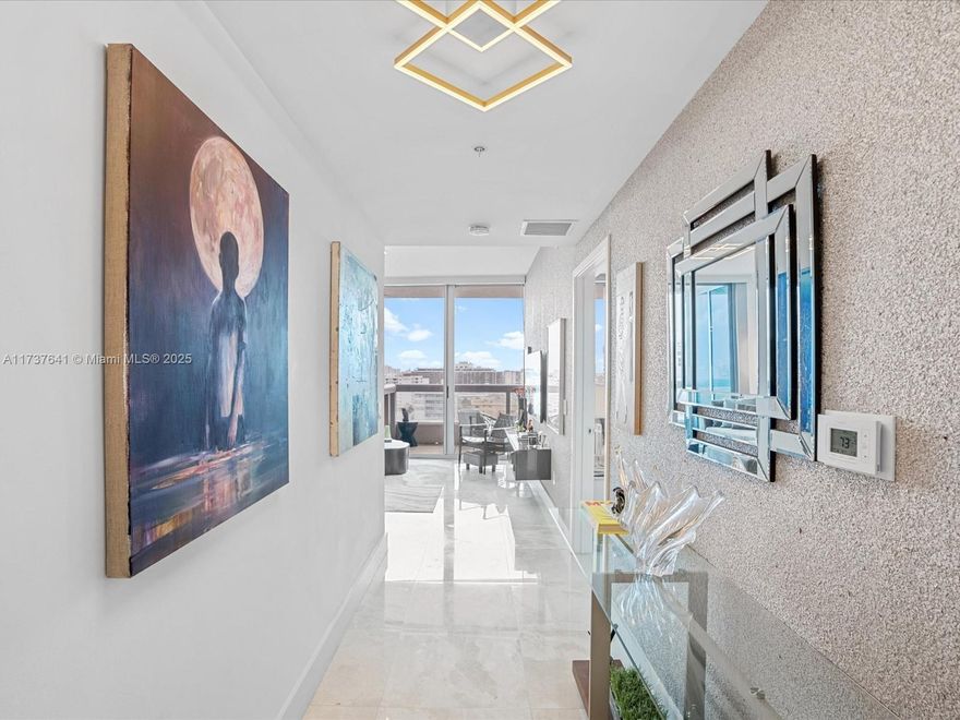 Beautiful unit in prestigious North Tower of Carillon Miami Wellness Resort, a premier oceanfront property. Sunset, bay and city views from specious terrace and every room. Beautiful, zebrawood  color kitchen, upgrade lighting fixtures, doors & many other details. Classes offered seven days a week from morning to early evening. Full use of 70,000 sq ft fitness/spa center and amenities, along with unlimited participation in classes included in condo fees. Salon; 4 pools; concierge; restaurant; pool and beach service, bar, 24-hour security, valet, wellness staff, boardwalk, and full service beach . Walking neighborhood with all conveniences: cafes, drug stores and, Publix across the street. Enjoy the lifestyle of luxury in a community that values wellness. Best Priced 2 Beds. Owner financing