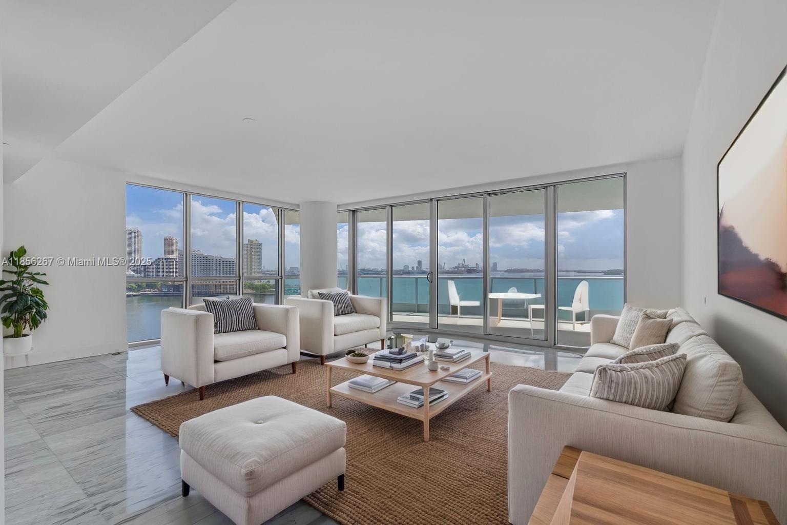 Elevate your lifestyle in this extraordinary corner residence at the prestigious Jade Brickell, where panoramic bay and ocean views frame every room. Spanning 1,878 sq ft, this 2 bed / 2.5 bath home features private elevator entry, polished marble floors, and a gourmet kitchen with top-tier appliances. Floor-to-ceiling impact glass creates a seamless connection to the water and skyline. Enjoy world-class amenities—an infinity-edge pool, spa, state-of-the-art fitness center, racquetball, concierge, valet, and more—all in the heart of Brickell, steps from luxury shopping, fine dining, and vibrant nightlife. Vacant and ready to impress.
