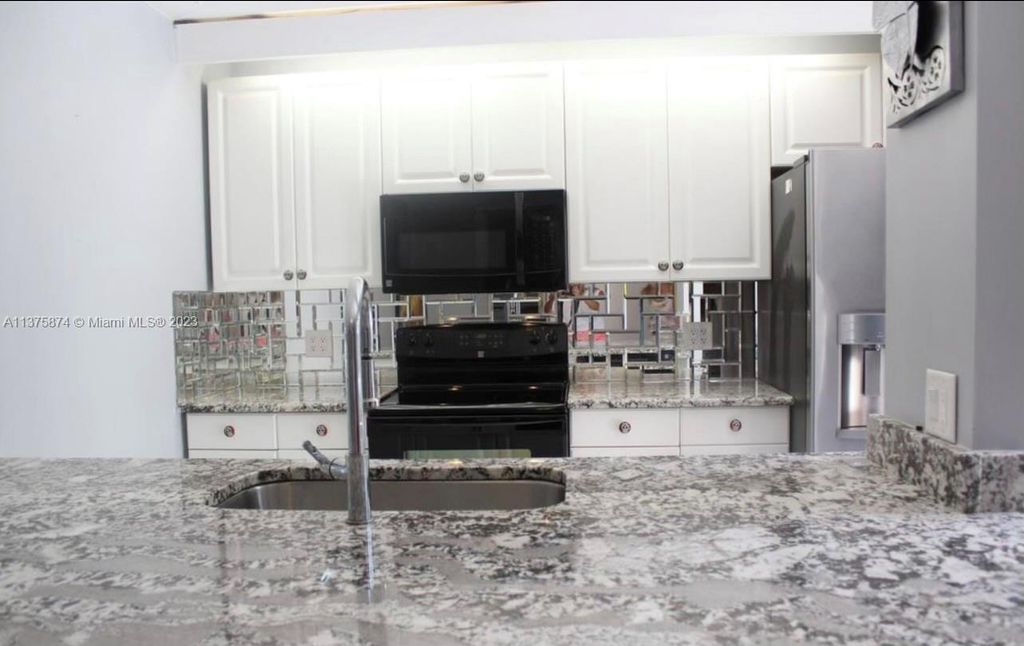 Photo of 1716 17th Ct, Jupiter, FL 33477 (MLS # A11375874)