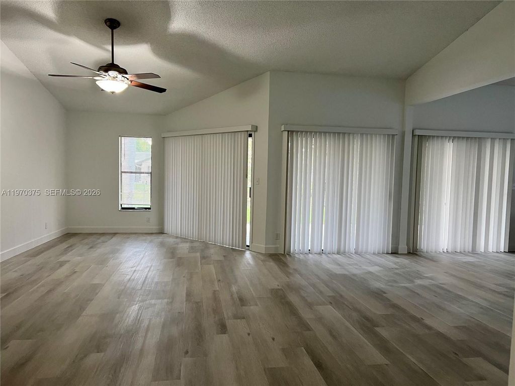 Photo of 6641 NW 52nd St #6641, Coral Springs, FL 33067 (MLS # A11970375)
