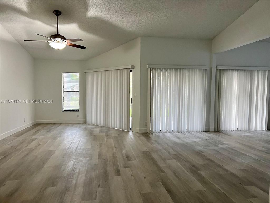 Photo of 6641 NW 52nd St #6641, Coral Springs, FL 33067 (MLS # A11970375)