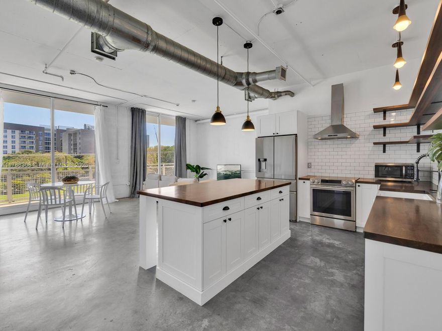 Welcome to LOFT 402 @ The Yorker Condo! With just under 1,000 SF, you’ll love the great open-flow plan in this one-bedroom, two full bath, modern industrial, “executive style” loft residence. Once a two-bedroom unit, walls were removed to create a more open and expansive living space, yet if preferred, it can be reverted to a two-bedroom. Great features: large updated kitchen with storage galore, open shelving, butcher block counters, wine cooler and massive island; volume 10-ft ceilings; polished concrete floors; grand balcony with dining and lounging space; spacious walk-in closet with laundry closet. All in a bright, open, airy, south-facing unit in a fantastic Edgewater location, within a tranquil boutique building with low maintenance, near coffee shops, groceries, and restaurants.