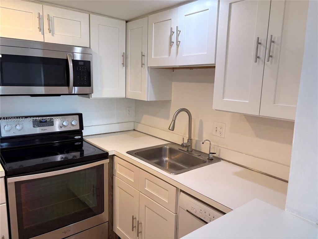 Photo of 4164 Inverrary Dr #410, Lauderhill, FL 33319 (MLS # A11988157)