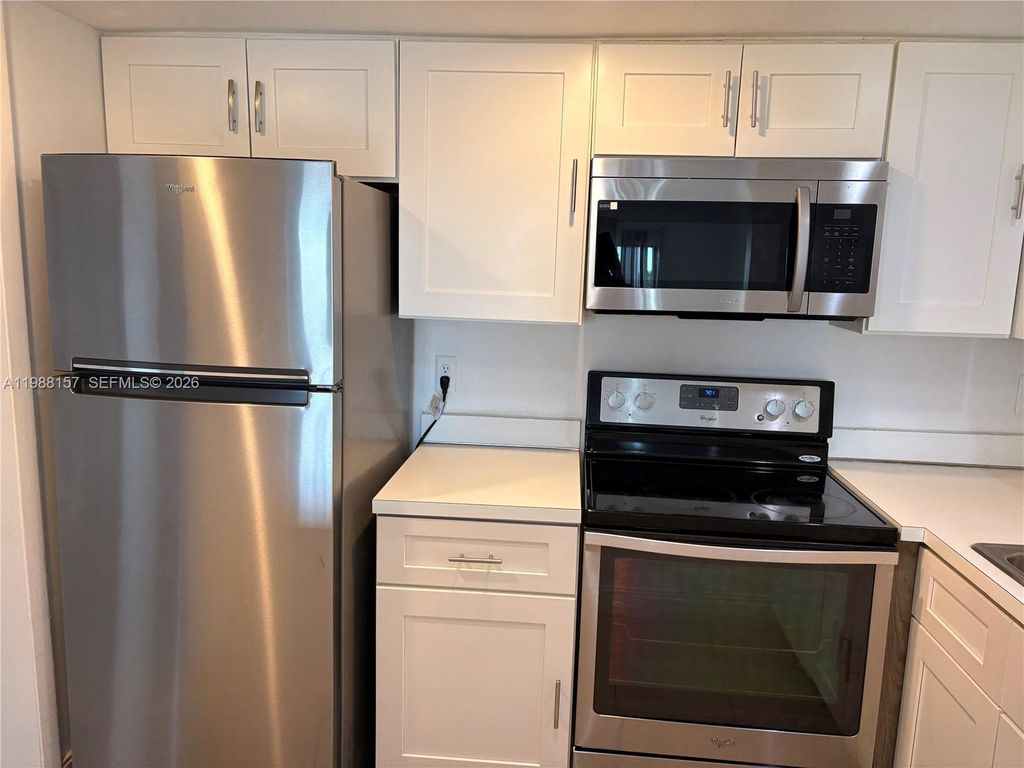 Photo of 4164 Inverrary Dr #410, Lauderhill, FL 33319 (MLS # A11988157)