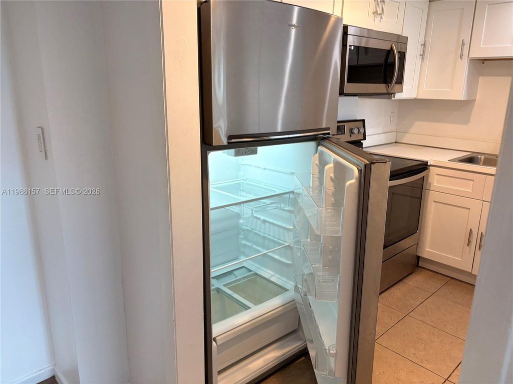 Photo of 4164 Inverrary Dr #410, Lauderhill, FL 33319 (MLS # A11988157)