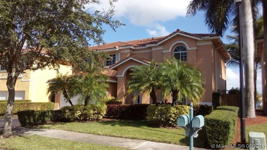 Mediterranean home in a elegant boat friendly community. 4 Bedrooms and extra room for office or 5th bedroom.  Formal living and dining room.  Wood cabinets, granite counter tops and SS appliances. Big lake and pool.