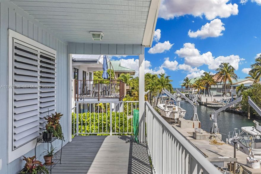 Welcome to your ideal Florida Keys getaway in the heart of Marathon! This beautifully furnished 2-bedroom, 2-bath canal-front home offers the perfect balance of relaxation and adventure. Located on a peaceful canal just moments from open water, you can enjoy fishing right from the 37.5-foot concrete dock or hop on your boat for a quick ride to the renowned Vaca Cut, providing easy access to both the Atlantic Ocean and the calm waters of Florida Bay. A rare opportunity for waterfront living in the Keys—shorter-term rental options may be available 6 month minimum for an additional cost. Tenant occupied until 09/01/26